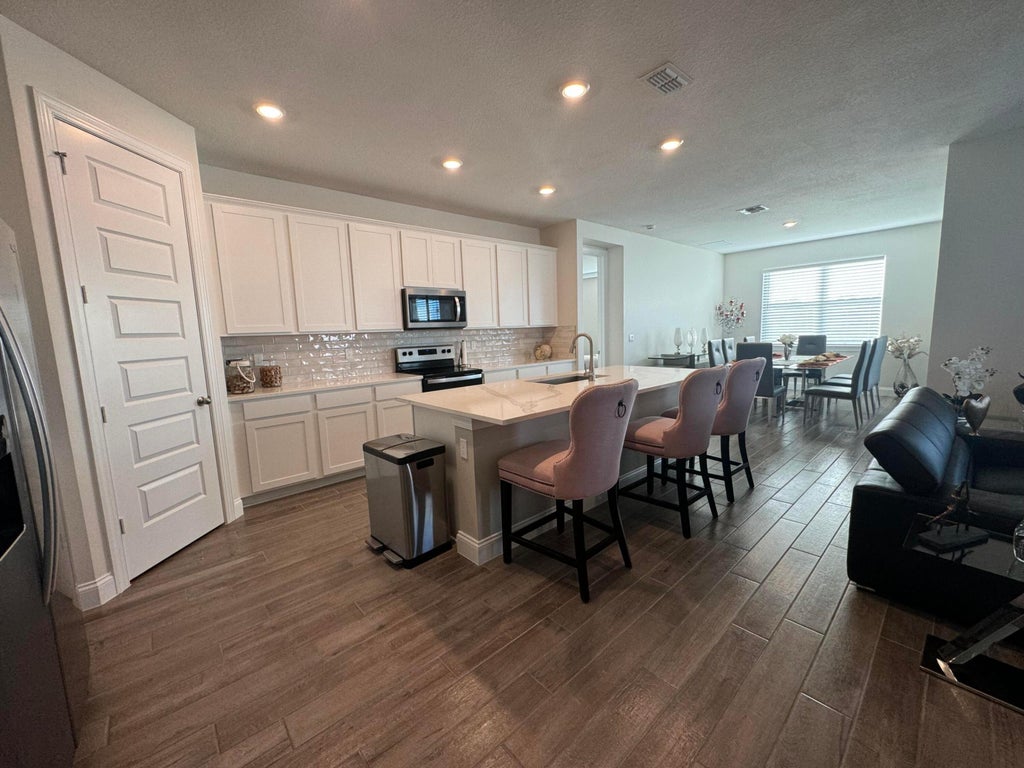 Photo of 8643 Dahlia Circle, Port Saint Lucie, FL 34986 (MLS # R11034789)
