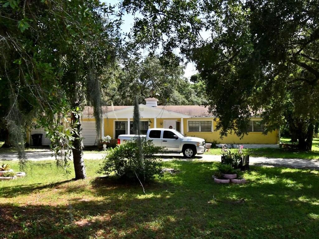 Photo of 819 Tumblin Kling Road, Fort Pierce, FL 34982 (MLS # R11103640)
