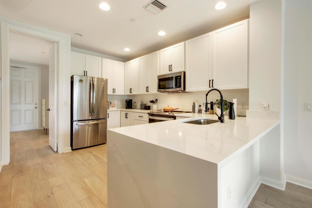 Photo of 3424 W Community Drive, Jupiter, FL 33458 (MLS # R11064201)