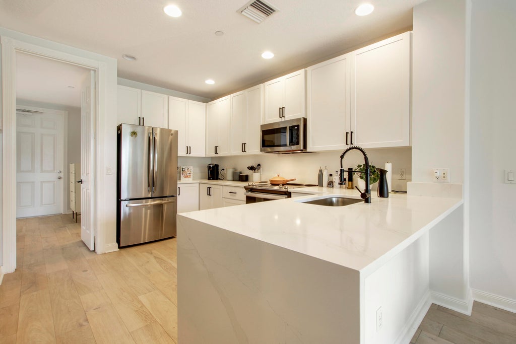 Photo of 3424 W Community Drive, Jupiter, FL 33458 (MLS # R11064201)