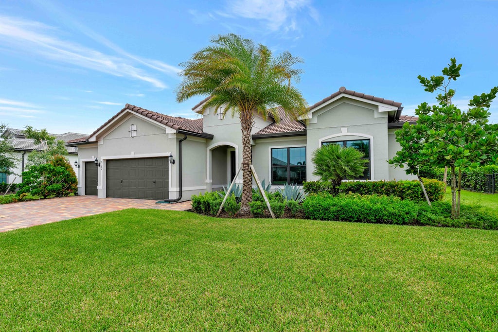 Photo of 9174 Balsamo Drive, Palm Beach Gardens, FL 33412 (MLS # R11011248)