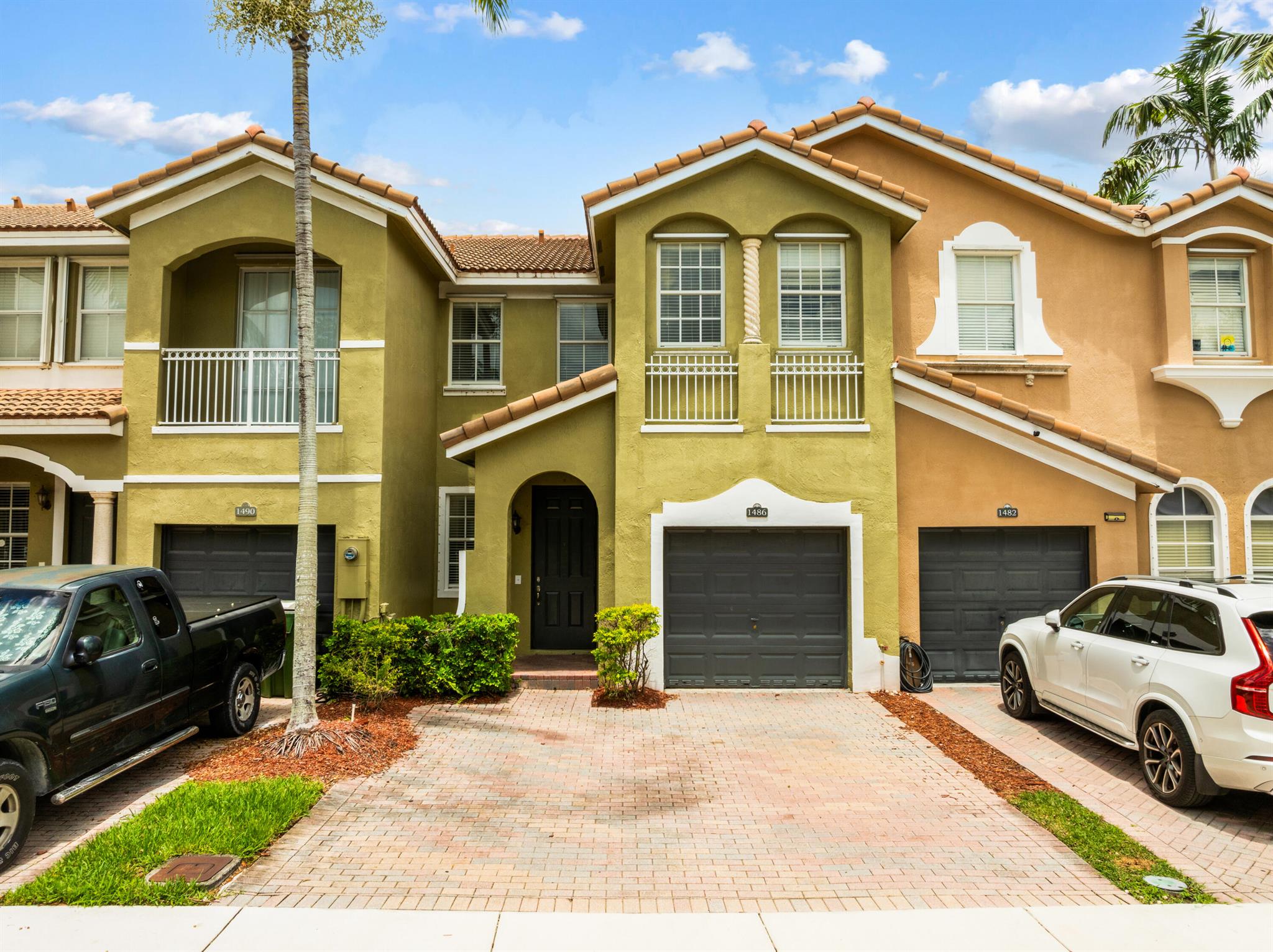 Lovely 3BD/2.5BA townhome in gated Homestead community of Keys Garden/Palm Breeze! Features aprox 20-ft ceilings, patio, attached garage, walk-in closets, storage under stairs, and A/C (2024). Community amenities include pool, gym, BBQ area, playground and clubhouse. Washer/Dryer is on the second floor! Pet friendly. Allows rentals. Approximately 35 miles from Key Largo, perfect for weekend getaways! Explore nearby favorites like Everglades National Park, Coral Castle, and Homestead Bayfront Park. Close to dining, schools and hospital. Being sold AS-IS. Don't miss this opportunity to enjoy space, sunshine, and Florida charm!