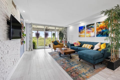 Photo of 575 Oaks Lane #708, Pompano Beach, FL 33069 (MLS # B26086378)
