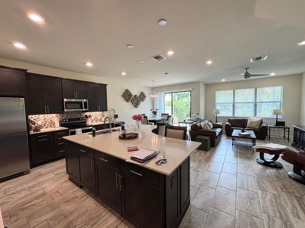 Photo of 8349 Cadre Noir Road, Wellington, FL 33467 (MLS # B26011385)
