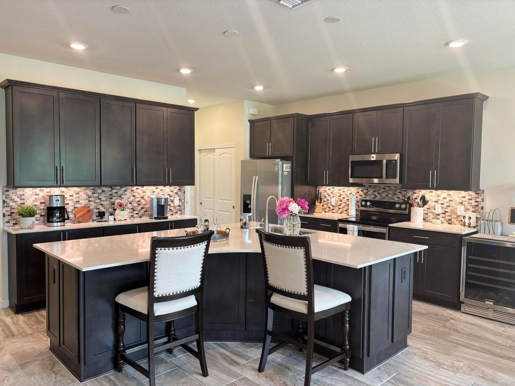 Photo of 8349 Cadre Noir Road, Wellington, FL 33467 (MLS # B26011385)