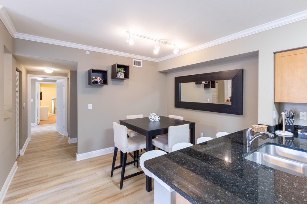 Photo of 6559 Emerald Dunes Drive #201, West Palm Beach, FL 33411 (MLS # R11107284)