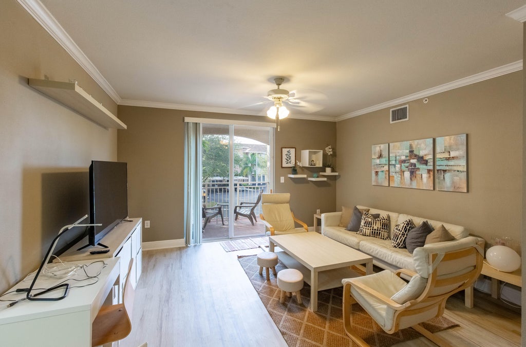 Photo of 6559 Emerald Dunes Drive #201, West Palm Beach, FL 33411 (MLS # R11107284)