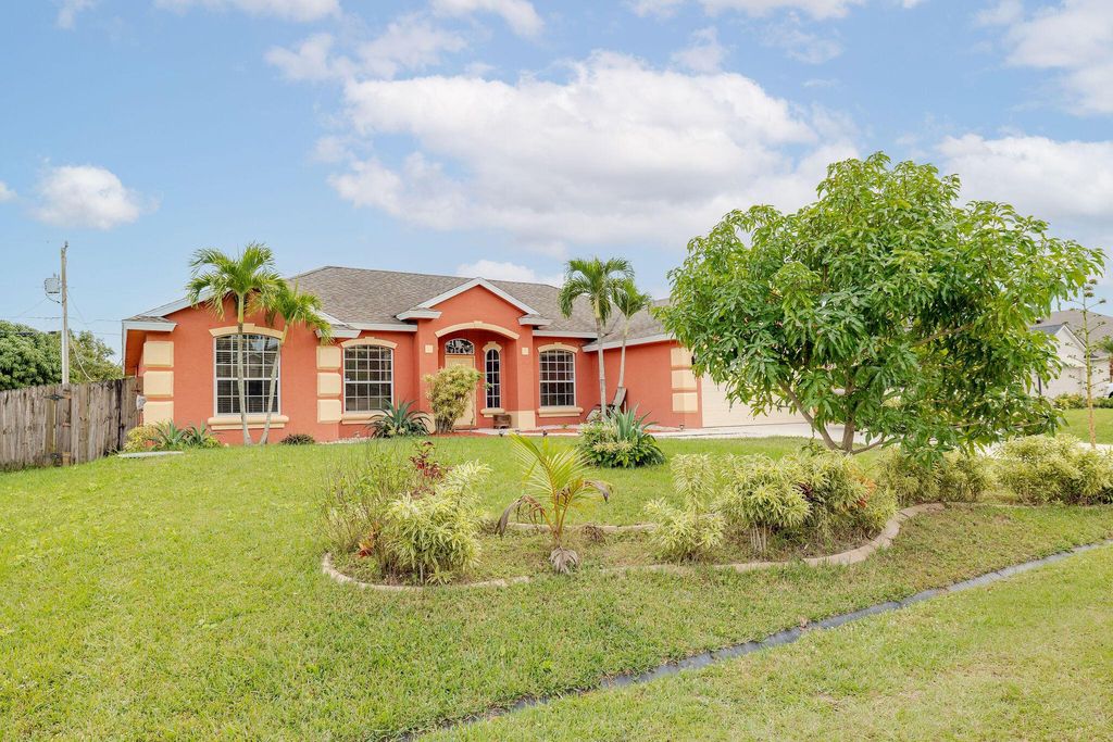 Photo of 1941 SW Logan Street, Port Saint Lucie, FL 34953 (MLS # R10946295)