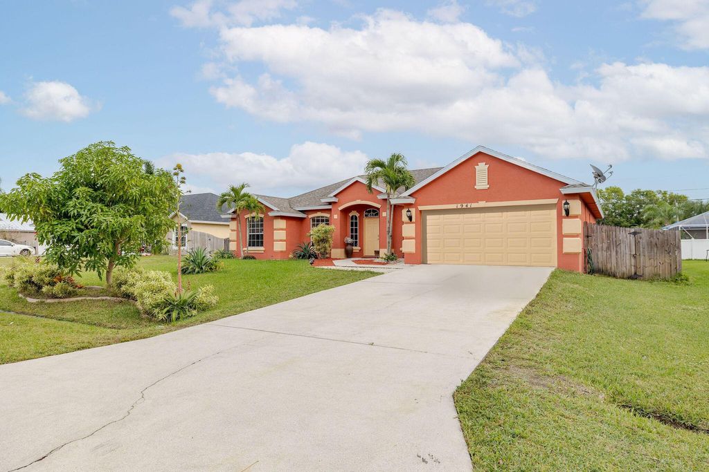 Photo of 1941 SW Logan Street, Port Saint Lucie, FL 34953 (MLS # R10946295)