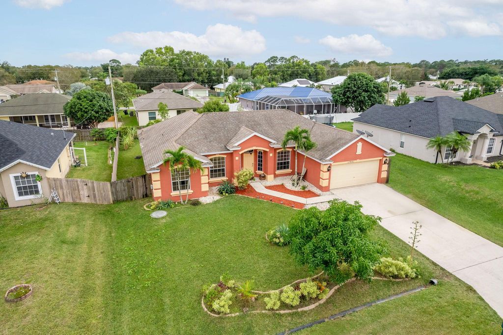 Photo of 1941 SW Logan Street, Port Saint Lucie, FL 34953 (MLS # R10946295)