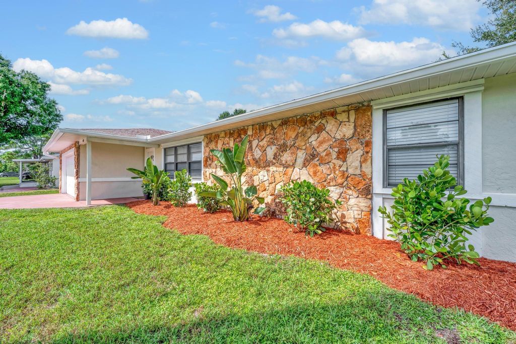 Photo of 1131 SE Puritan Lane, Port Saint Lucie, FL 34983 (MLS # R11108374)