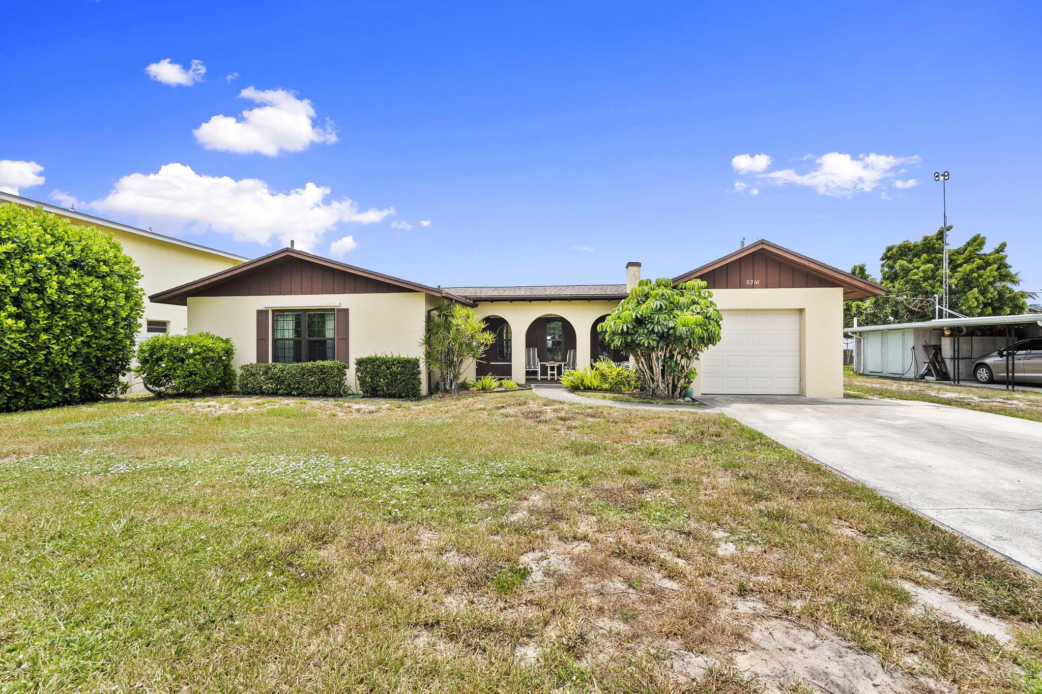Discover this solid 3-bed, 2-bath CBS pool home in Rocky Point Estates! Boasting vaulted ceilings, formal living, family, and dining rooms, this gem features a cozy wood-burning fireplace and spacious walk-in closets in every bedroom. French doors open to a screened, under-truss patio overlooking the sparkling pool, perfect for relaxing or entertaining. The fenced yard includes a utility shed, and the roof was updated in 2016. This home needs updating and some TLC, offering a chance to personalize your dream space. Estate owners enjoy exclusive access to the Rocky Point Estates Marina, with a gated private boat ramp, fishing pier and pavilion--ideal for gatherings. Boat slips may be available for purchase. This is an estate sale that requires probate court approval. (quick process)