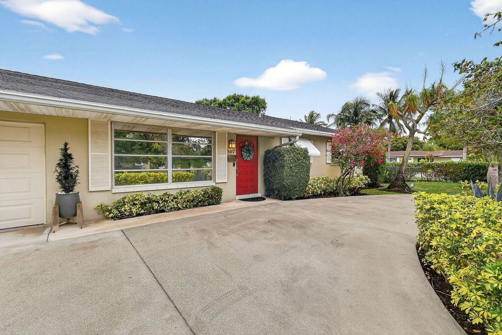 Photo of 807 5th Street, Lake Park, FL 33403 (MLS # B26001645)