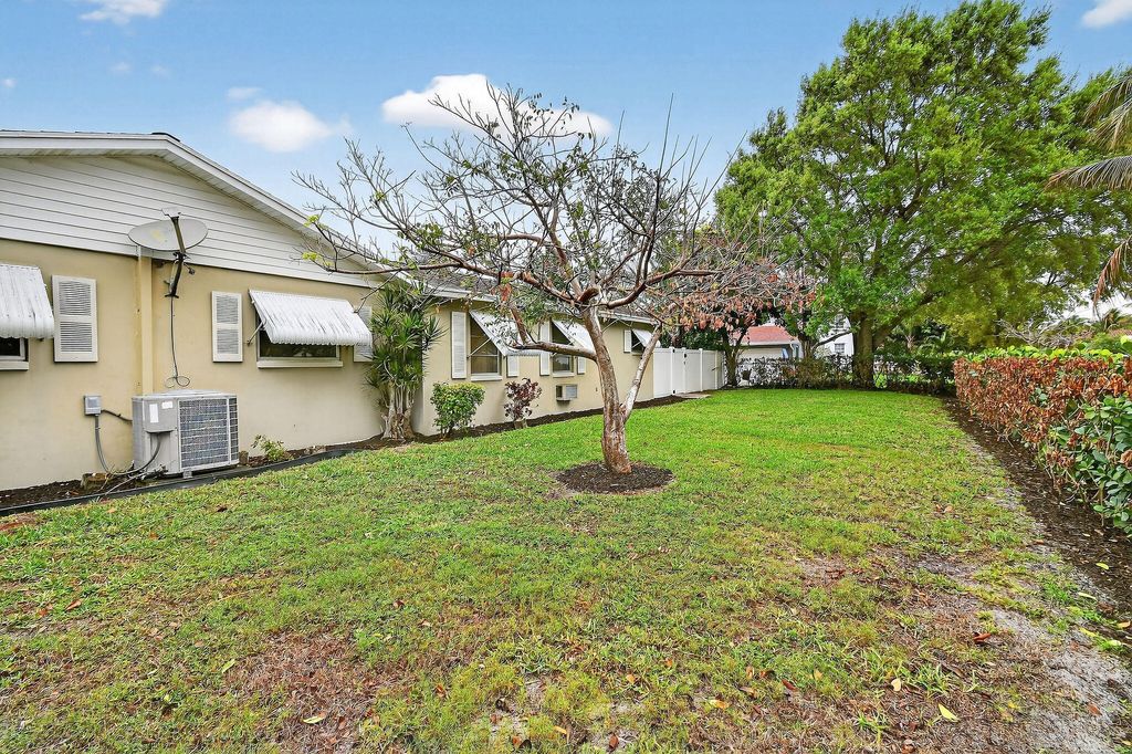 Photo of 807 5th Street, Lake Park, FL 33403 (MLS # B26001645)