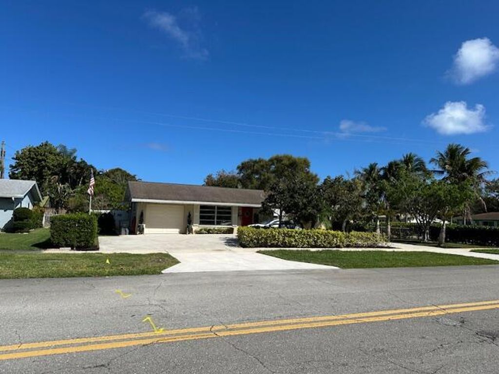 Photo of 807 5th Street, Lake Park, FL 33403 (MLS # B26001645)