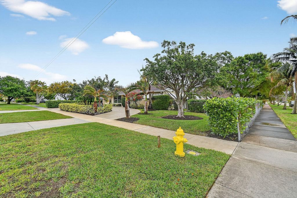 Photo of 807 5th Street, Lake Park, FL 33403 (MLS # B26001645)