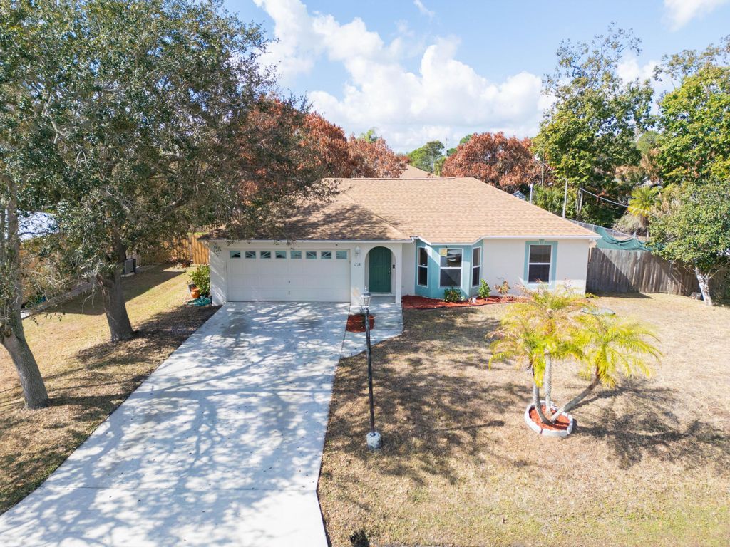 Photo of 1718 SE Aires Lane, Port Saint Lucie, FL 34984 (MLS # R11167391)