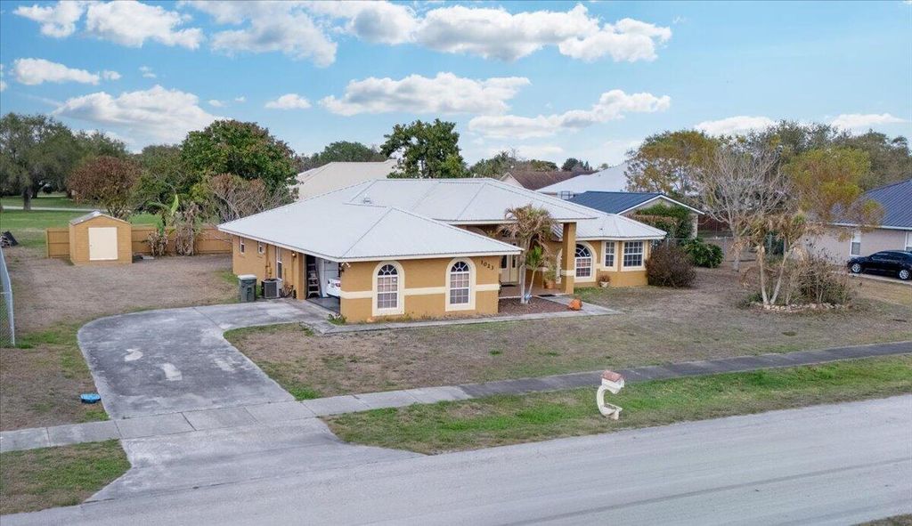 Photo of 1023 Caribbean Avenue, Clewiston, FL 33440 (MLS # B26000670)