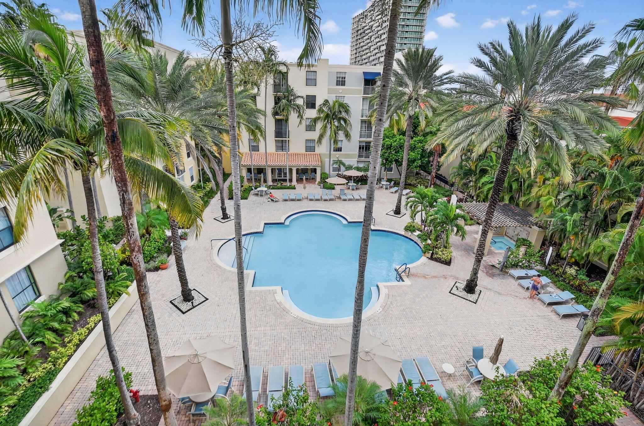Beautiful 2 BR/2BA overlooking the pool. Secure building, washer and dryer in unit, pool, fitness center, hot-tub. Granite counter tops in kitchen with much desired open floor plan. The Courtyards offers computer room, social room, game-room. Walk to everything CityPlace has to offer, across the street from Kravis Center and Dreyfus School of the Arts., Eataly opening soon! Walk to grocery, Entertainment, Convention ctr., 360 Rosemary, Clematis St., Retail, Restaurants, Bright-Line, Tri-Rail. and much more !