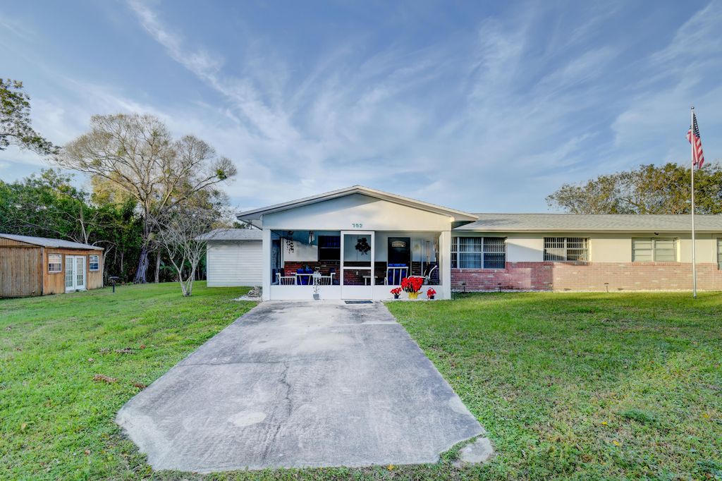 Photo of 702 Sharon Terrace, Fort Pierce, FL 34982 (MLS # R10951517)