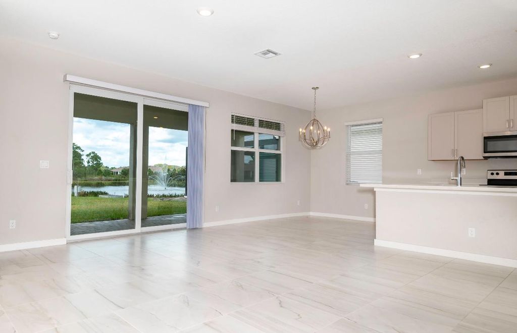 Photo of 4530 NW Exchange Avenue, Jensen Beach, FL 34957 (MLS # R10940087)