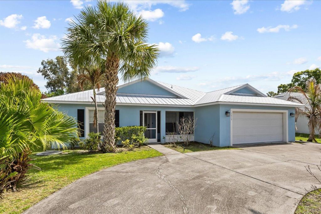 Photo of 1619 SW California Boulevard, Port Saint Lucie, FL 34953 (MLS # B26016668)