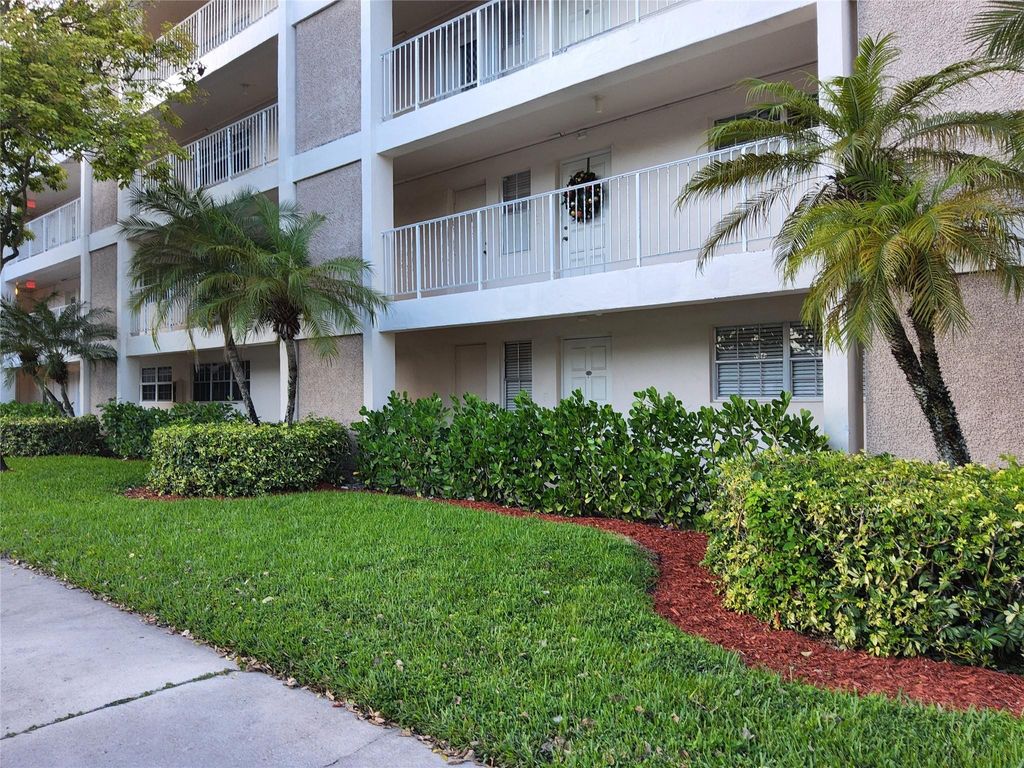 Photo of 3151 S Palm Aire Dr #107, Pompano Beach, FL 33069 (MLS # F10539183)