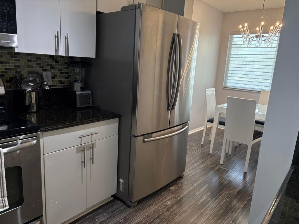 Photo of 7763 Southampton Ter #312, Tamarac, FL 33321 (MLS # B26000344)