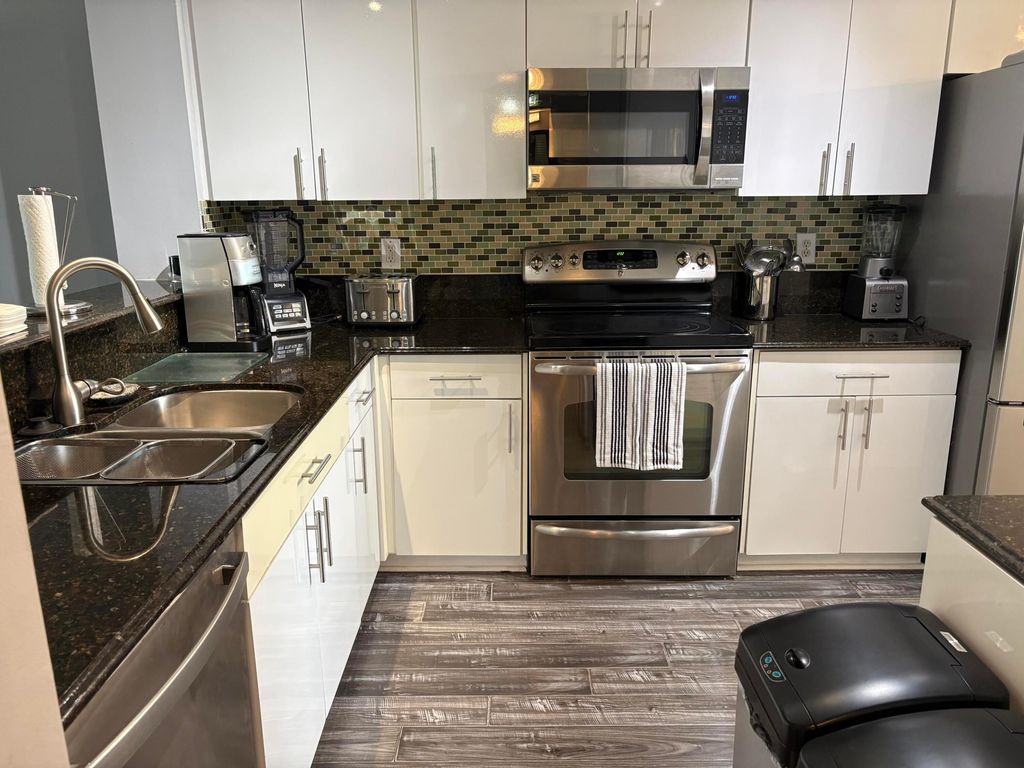 Photo of 7763 Southampton Ter #312, Tamarac, FL 33321 (MLS # B26000344)