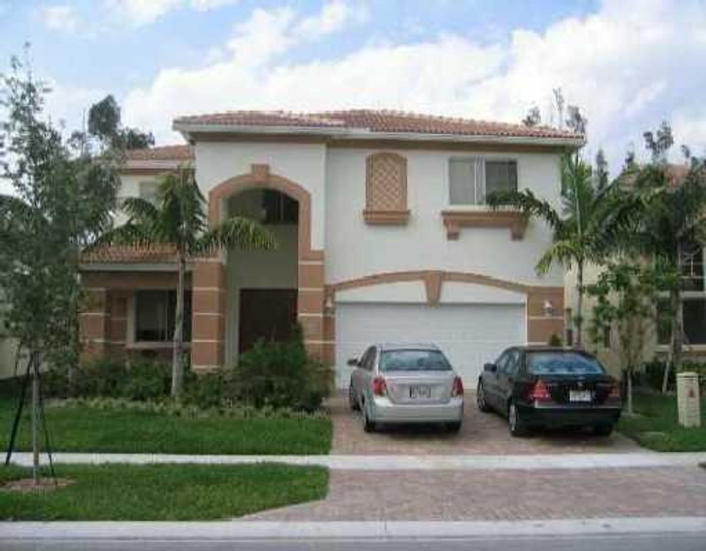 Photo of 900 Gazetta Way, West Palm Beach, FL 33413 (MLS # R11053008)