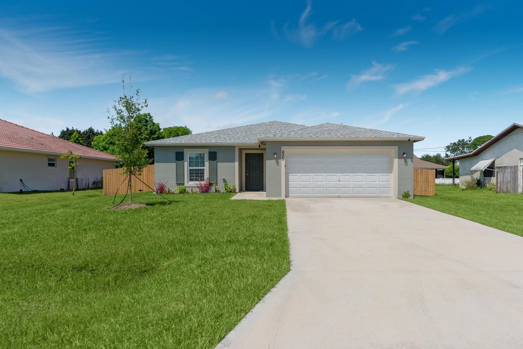 Photo of 625 SE Tanner Avenue, Port St Lucie, FL 34984 (MLS # R10915697)