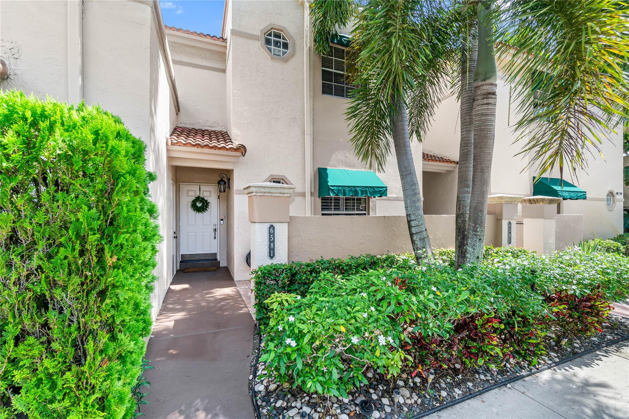 ELEGANT, BRIGHT, & SPACIOUS! 2 BED, 2 BATH in highly sought after PLUM at BOCA POINTE. This GORGEOUS condo features an OPEN FLOOR PLAN & FULLY ENCLOSED PATIO WITH IMPACT EVERYTHING! Beautiful flooring, a bright open kitchen, granite countertops, no popcorn ceilings, custom master closet, serene garden views, meticulously maintained, and ample guest parking. Walking distance to community pool. You Can Also Enjoy Luxury Living in BOCA POINTE with Memberships that are available but NOT mandatory. Condo dues include master insurance, roof maintenance, landscaping, water, alarm, & cable. Investor friendly (can rent up to 4x a year with a minimum of 30 days). Schedule a private showing.