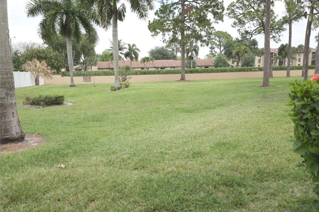 Photo of 801 Sky Pine Way #F2, Greenacres, FL 33415 (MLS # B26023523)