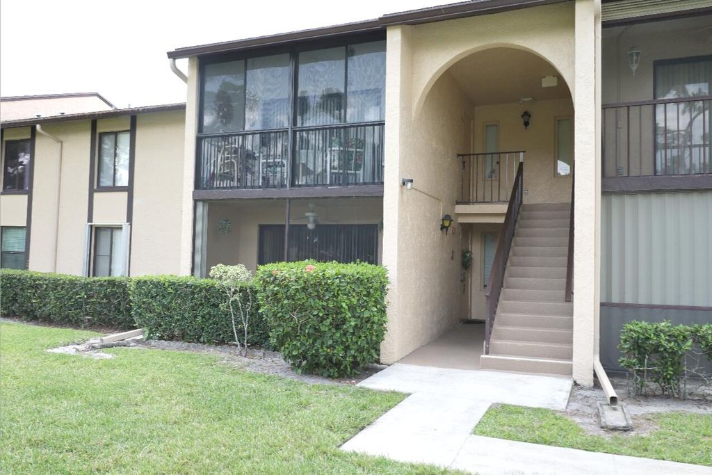 Photo of 801 Sky Pine Way #F2, Greenacres, FL 33415 (MLS # B26023523)