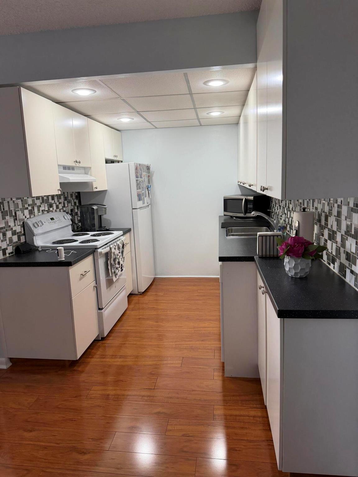 AINSLIE AT CENTURY VILLAG - Residential Lease