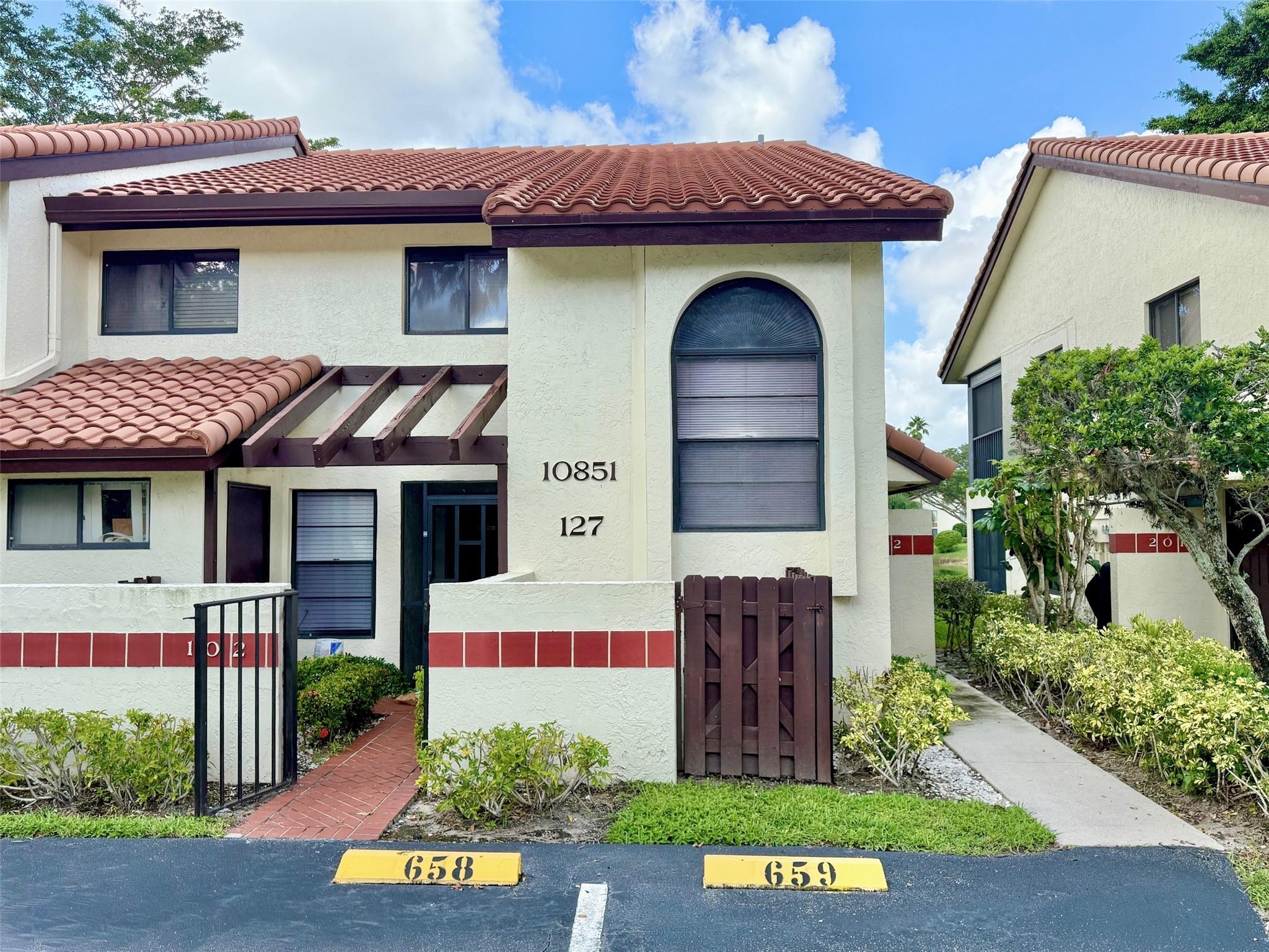 What a Beautiful Lake View this 2-Bedroom, 2-Bathroom Condo has! 3rd Bedroom is currently used as an Open Den. Screened-in 300 SF Lanai overlooking the lake, with pull-down shutters. Newer AC. Attic Storage. Large Primary Bedroom with ensuite bathroom and huge walk-in closet + an additional closet. Vaulted Ceilings with Bright, Open Feel. Park directly in front of the entrance with 2 assigned spaces. Located close to the clubhouse. Palm Chase is very welcoming with a 1/4-mile drive to the gated entrance. The Clubhouse Includes Olympic Size Temperature-Controlled (Heated/Cooled) Pool, Hot Tub, Fitness Rooms, Card Rooms, Billiards, Tennis, Pickleball & More. Strong Reserves. 55+ Active Community. Emotional Support Pets are Welcome! Assocation Fee Includes Just About EVERYTHING!