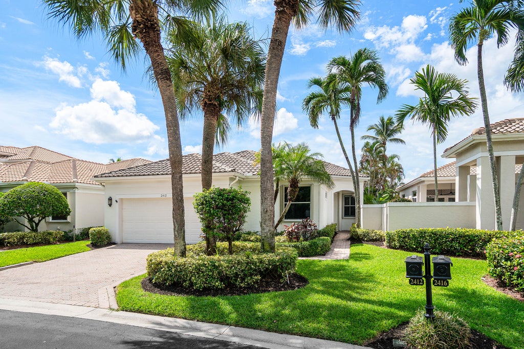 Photo of 2412 NW 67TH Street, Boca Raton, FL 33496 (MLS # B26068858)