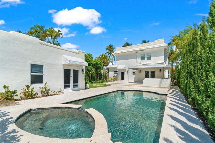 Tastefully renovated five-bedroom property available for annual lease, unfurnished. This gated residence features a beautiful outdoor space with a pool and jacuzzi/fountain. The two-story main house includes three bedrooms and three baths, a bright living room, formal dining room, and an upgraded kitchen. The guest house offers additional flexible living space, including a one-bedroom/bath guest suite with living area and kitchen, plus a separate one-bedroom cabana and bath.