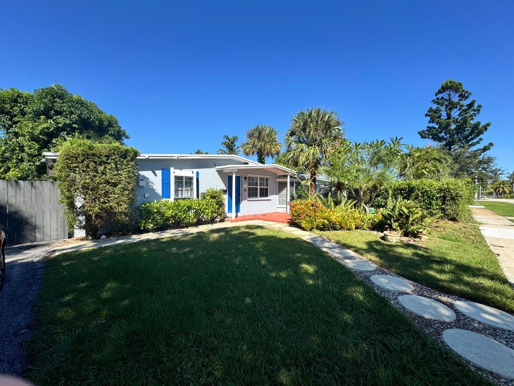 Photo of 919 Laurel Drive, Lake Park, FL 33403 (MLS # R11131849)
