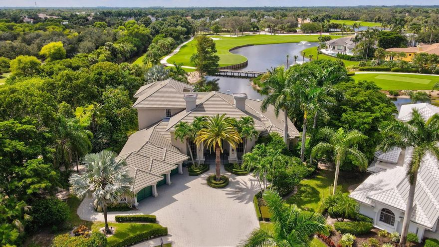 Discover the luxury and elegance of country club living at Addison Reserve, one of Delray Beach's most prestigious communities. Located on a private cul-de-sac, this expansive lot sits on over 1/2 an acre. The estate boasts breathtaking long lake views, overlooks the pristine golf course, and offers the utmost privacy as it neighbors the Morikami Preserve. Here is your opportunity to own an extraordinary estate in the highly coveted Brookfield Estates, which is an exclusive enclave of only 22 homes.Step inside to this double door entry, to vaulted ceilings and an incredible layout, boasting over 6,000+sqft under air, 5 spacious bedrooms, a stately office that feels more like a private library, and a second story loft with an incredible terrace balcony, 3 car garage + golf cart entrance.