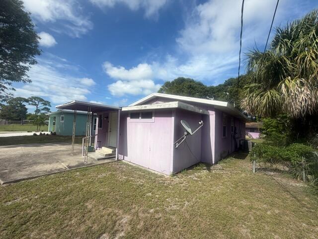 Photo of 1804 S 30th S ST, Fort Pierce, FL 34947 (MLS # B26038768)