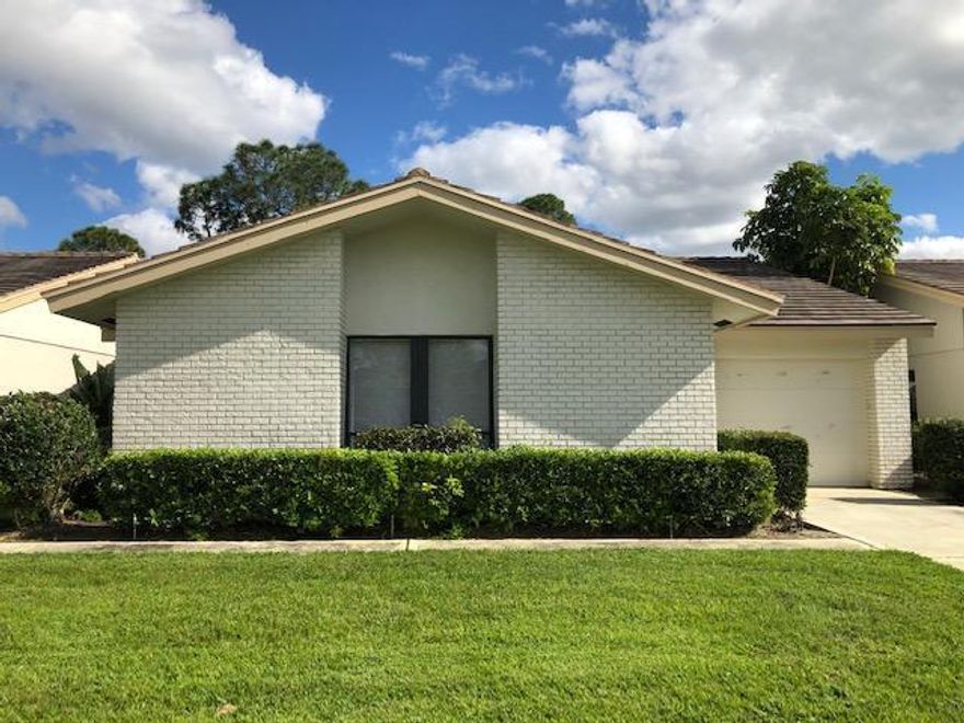 Three bedroom, in the highly desired Martin Downs Country club. Gated community with security.  Martin Downs Country Club amenities available include a Health Club, Pool(s), Golf Course and a Country Club with Restaurant. A Beautiful view of the Golf Course and Pond.