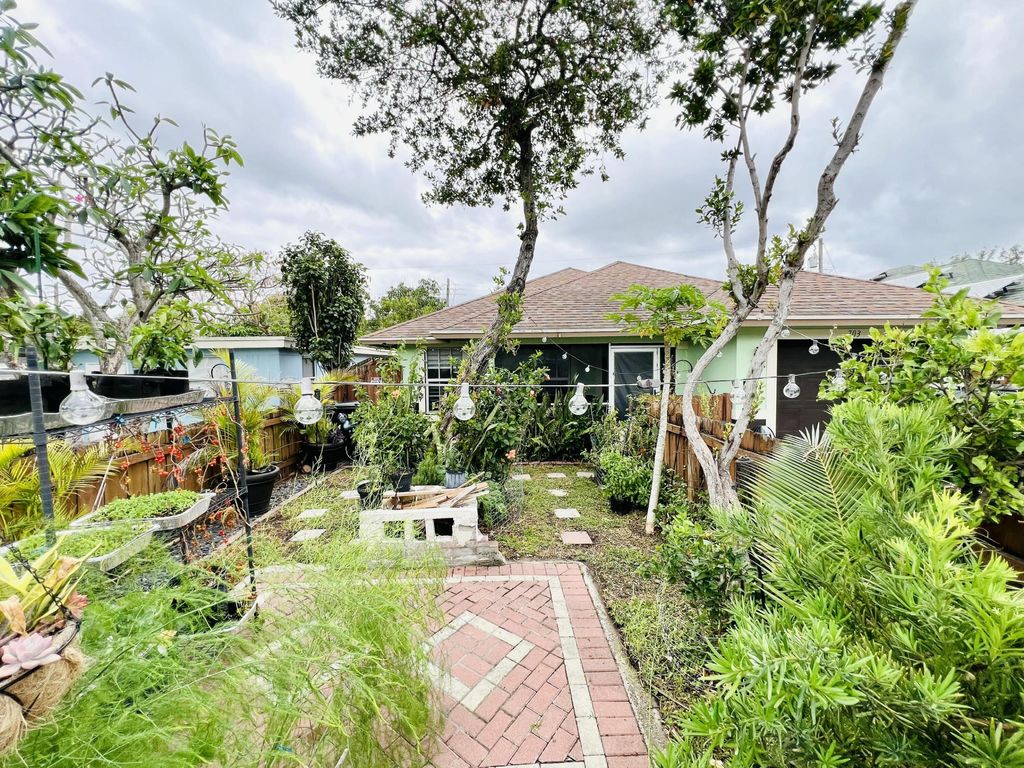 Photo of 703 S A Street S, Lake Worth Beach, FL 33460 (MLS # B26019492)