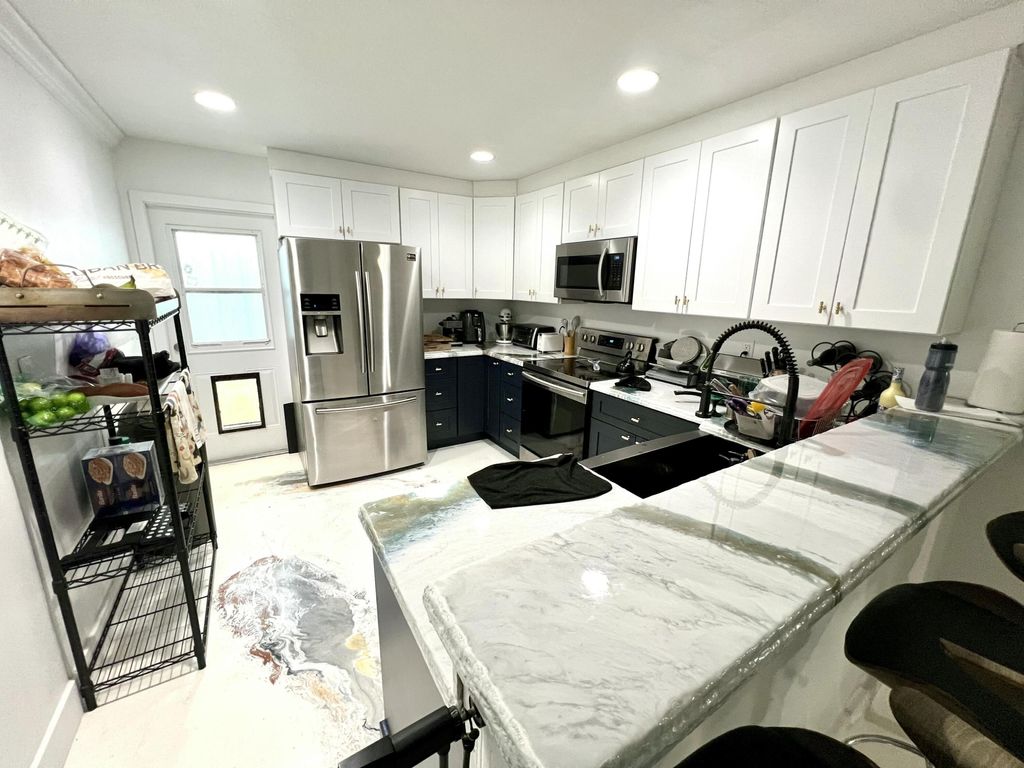 Photo of 703 S A Street S, Lake Worth Beach, FL 33460 (MLS # B26019492)