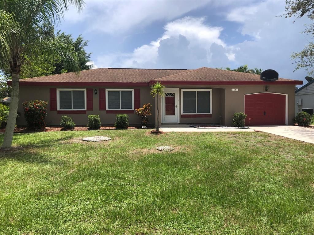 Photo of 2057 SE Hideaway Circle Cir, Port Saint Lucie, FL 34952 (MLS # R10817756)
