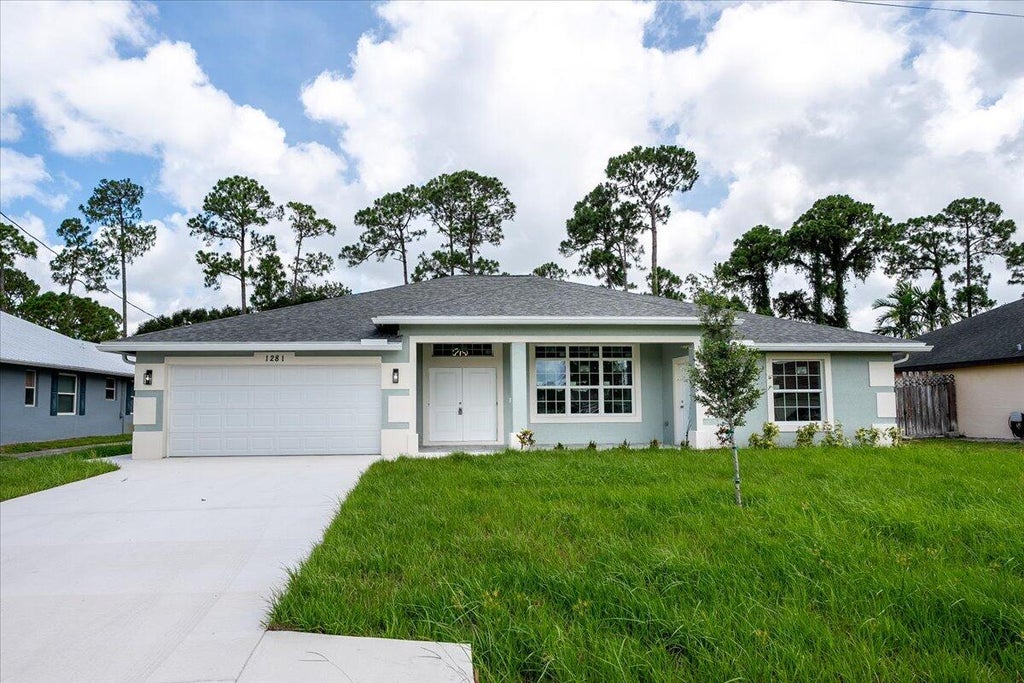Photo of 1281 SW Ingrassina Avenue, Port Saint Lucie, FL 34953 (MLS # R10999091)