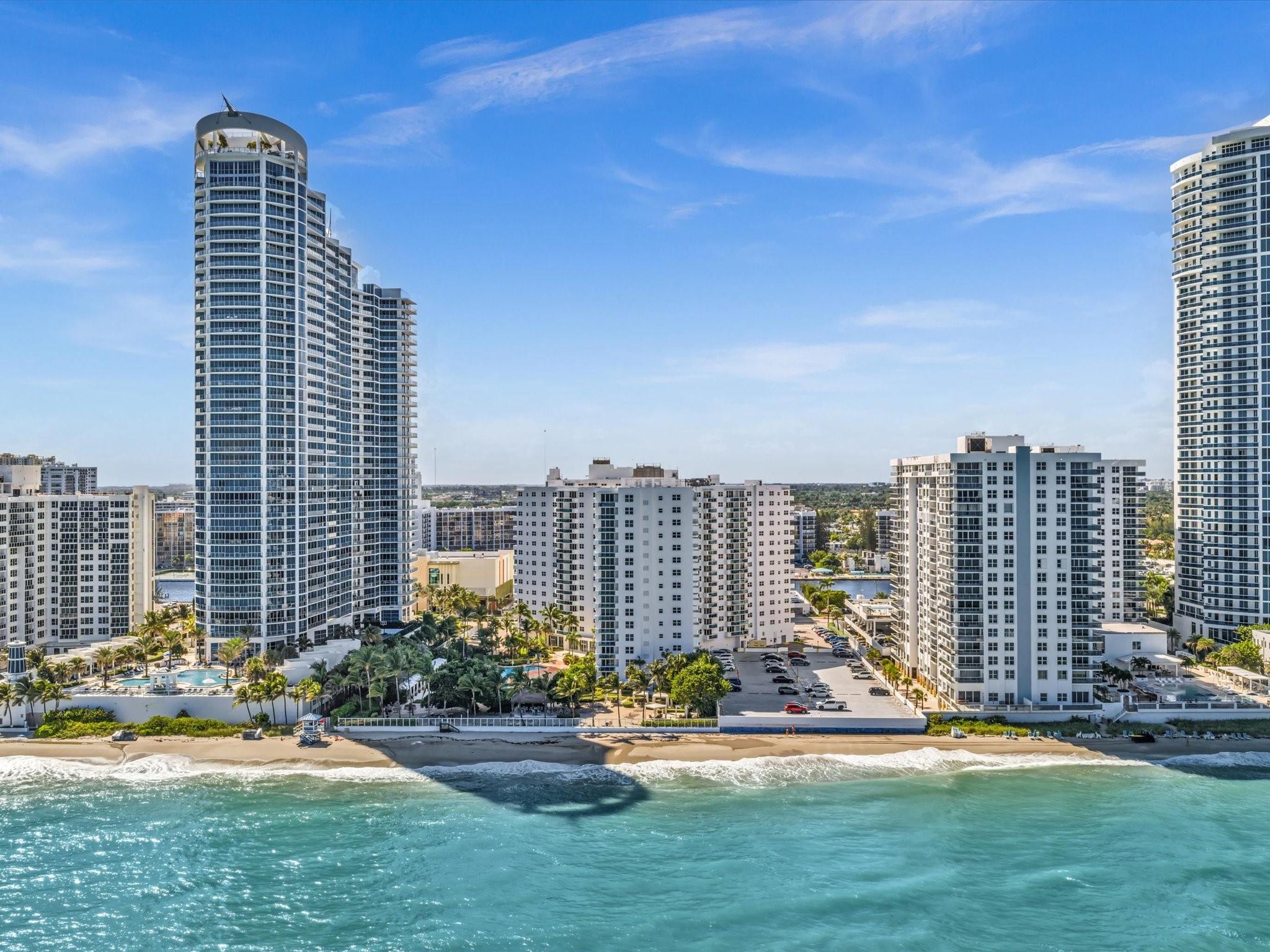 Welcome to The Residence, this 2-bedroom, 2-bath condo with stunning beach views, intercostal views, city views, and direct access to the sand. This spacious residence features an open layout, private balcony, waterproof floors, and resort-style amenities including a beachfront pool, fitness center, and 24-hour security. Located in the heart of Hollywood, just minutes from the dining, shopping, and entertainment, this condo offers the perfect blend of comfort and coastal living. 15 minutes from Fort Lauderdale airport. Impact windows will be installed by the association beginning October on all units. Association requires 680 credit score.