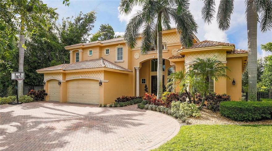 Nestled between the ocean and the Intracoastal you'll find this spectacular home located on an oversized lot and featuring a brick-paved driveway and loads of curb appeal.On A quiet cul-de-sac, attached to a natural preserve this elegant 2 story Ocean Ridge Estate newly built in 2007 contains 5,300 square feet and boasts Vaulted ceilings with a spacious open floor plan, and a first-floor master suite. Tropical landscaping surrounds resort style over-sized pool with beach entrance and jacuzzi. You are just eight houses away from the beach where you can enjoy the wonderful Florida beaches. The house is located just minutes from Atlantic Ave in Delray Beach.