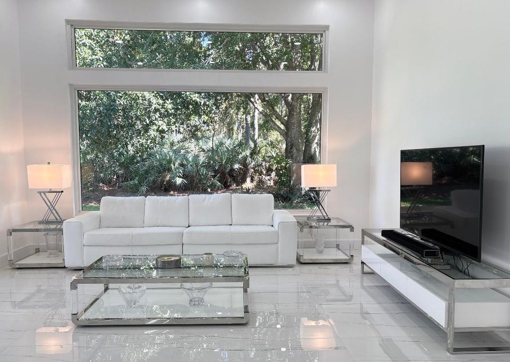 Photo of 623 SW Lake Charles Circle, Port Saint Lucie, FL 34986 (MLS # R11060756)