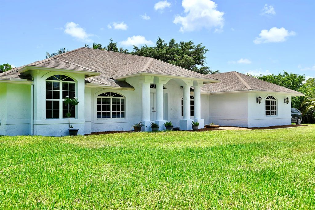 Photo of 16064 Hamlin Boulevard, The Acreage, FL 33470 (MLS # R11007866)